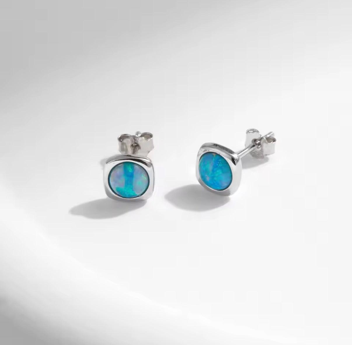 Bloo & Co Mini Square Blue Surround Earrings.